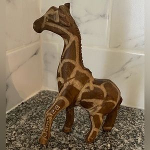 Handsome hand-carved wooden giraffe figure from Jamaica.